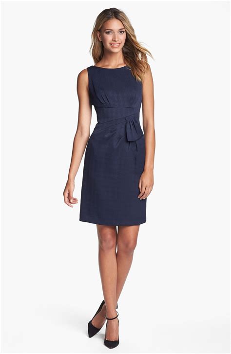 navy blue sleeveless sheath dress.